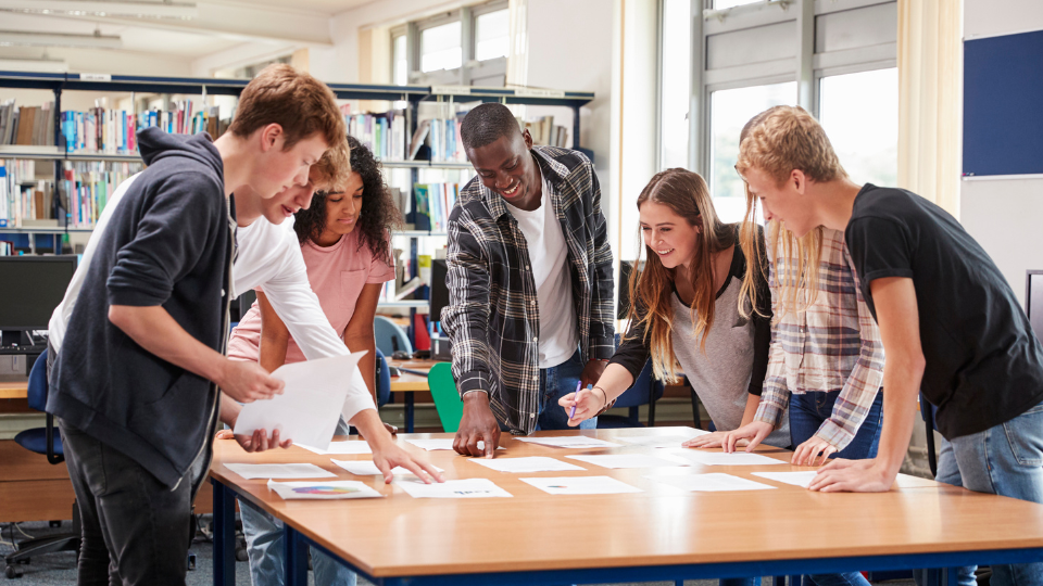 college students gathered around a table