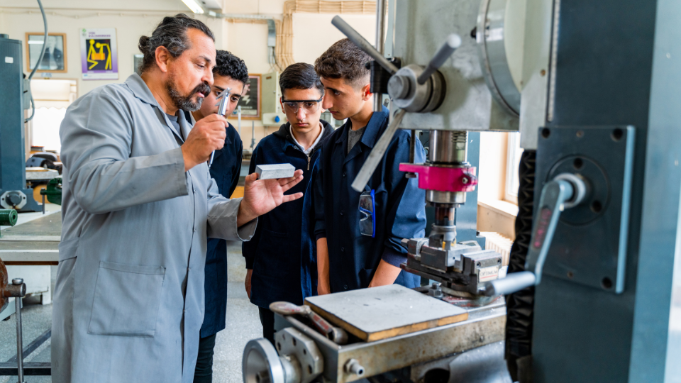 student learning in a welding class