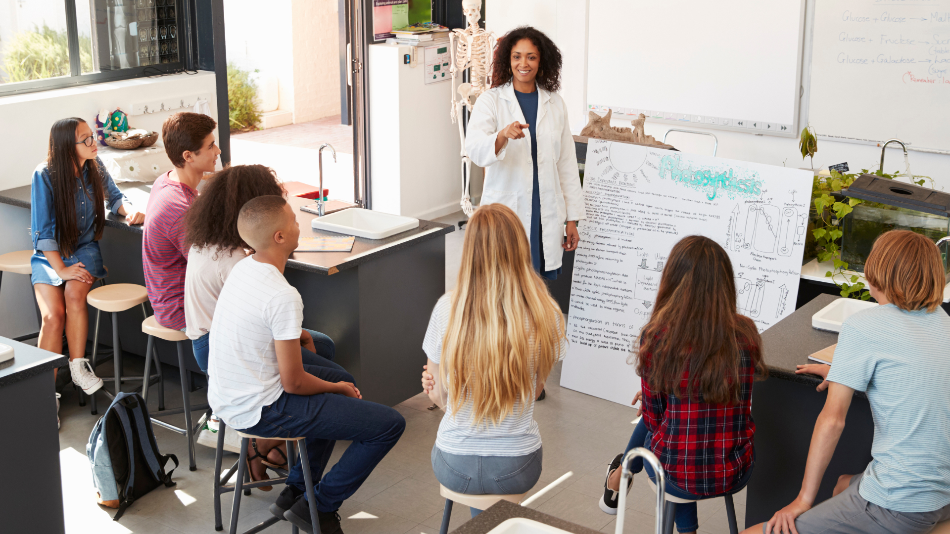 students listening to a science teacher