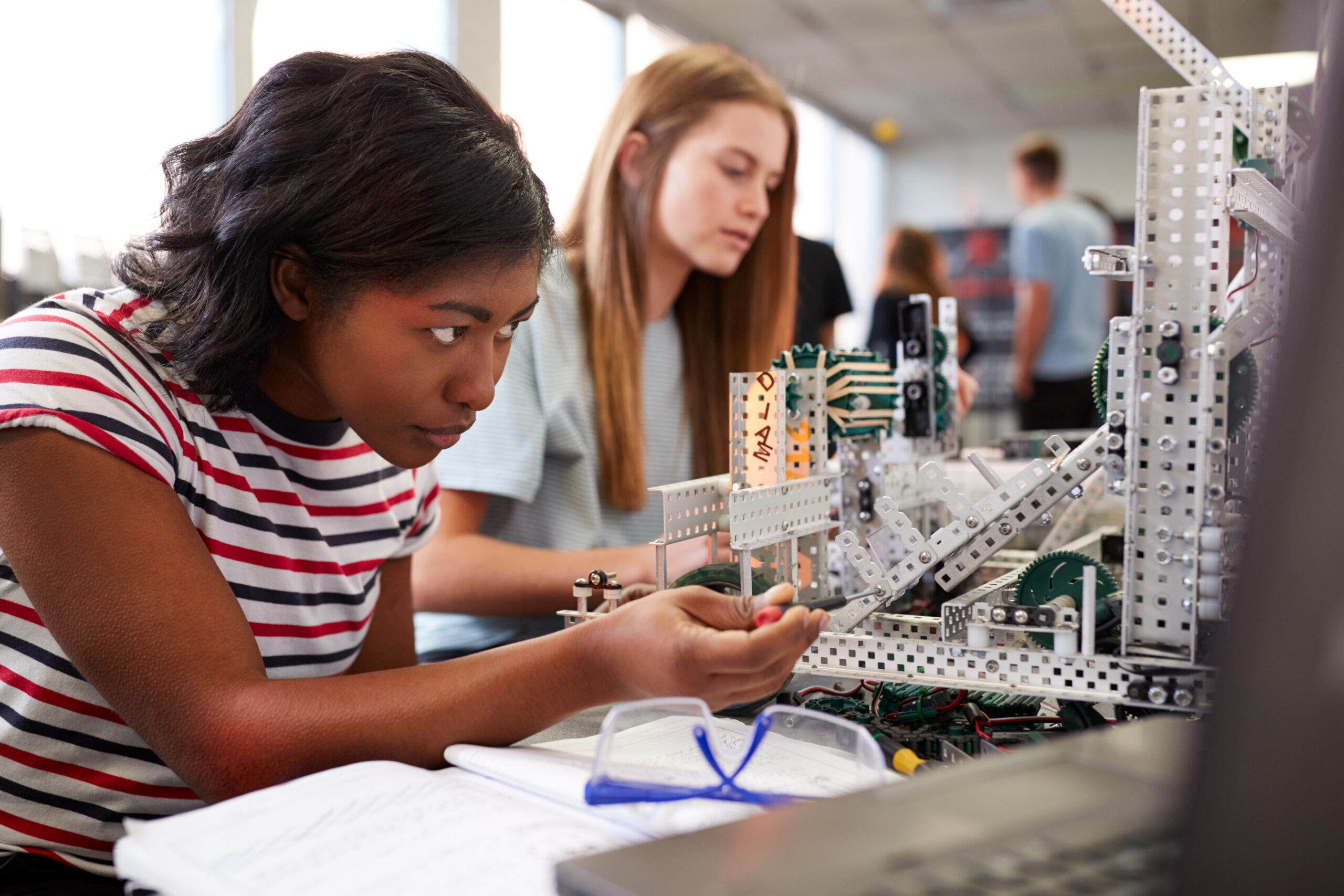 two female students working together in a science class